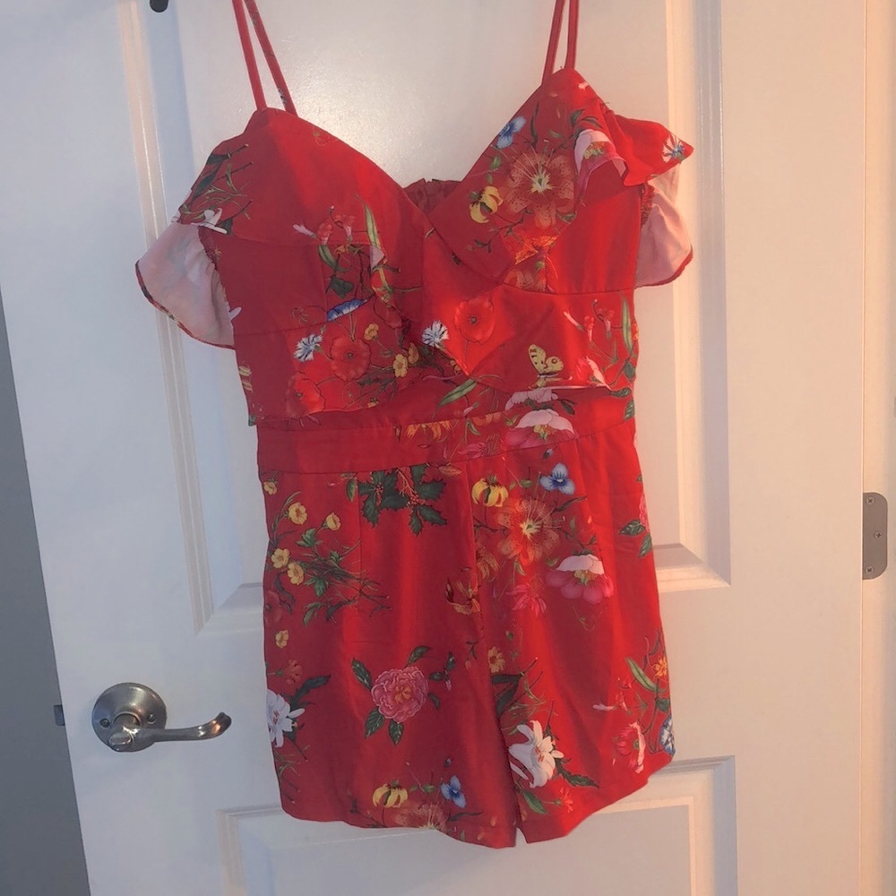 Off the shoulder tropical romper.